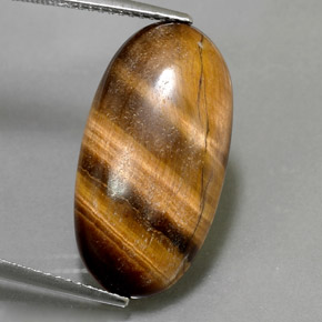 11.79カラットの天然ゴールドブラウンTiger's Eye（23.3×12.2 mm・オーバルカット）
