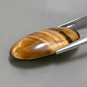 11.79カラットの天然ゴールドブラウンTiger's Eye（23.3×12.2 mm・オーバルカット）