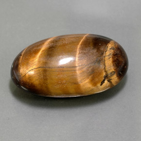 26.13カラットの天然ゴールドブラウンTiger's Eye（24.8×15.3 mm・オーバルカット）