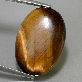 10.40カラットの天然ゴールドブラウンTiger's Eye（19.5×13.7 mm・オーバルカット）
