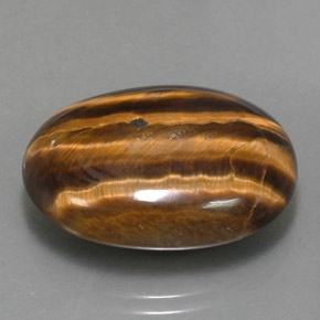 25.04カラットの天然ゴールドブラウンTiger's Eye（23.9×18 mm・オーバルカット）