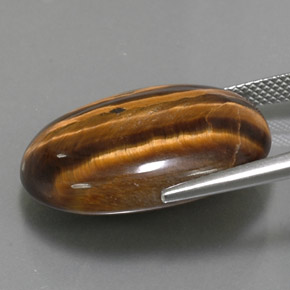 25.04カラットの天然ゴールドブラウンTiger's Eye（23.9×18 mm・オーバルカット）