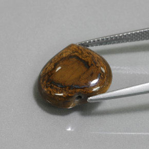 8.46カラットの天然ゴールドブラウンTiger's Eye（14.2×13.4 mm・ハート型）