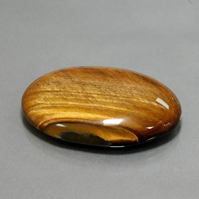 68.47カラットの天然ゴールドブラウンTiger's Eye（39.2×27.1 mm・オーバルカット）