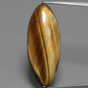 14.53カラットの天然ゴールドブラウンTiger's Eye（27.3×11 mm・マーキス）