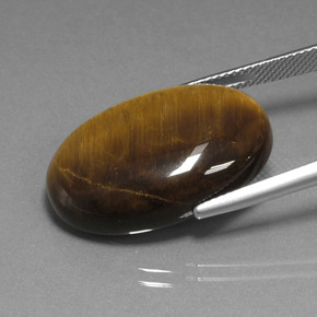 20.98カラットの天然ウォームブラウンTiger's Eye（24.8×16.6 mm・オーバルカット）