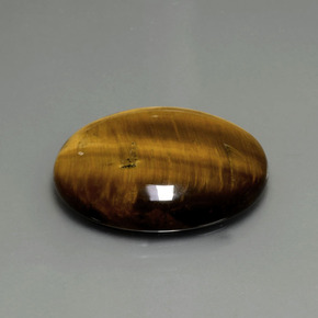 22.43カラットの天然ゴールドブラウンTiger's Eye（25.2×20.3 mm・オーバルカット）
