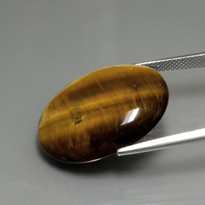22.43カラットの天然ゴールドブラウンTiger's Eye（25.2×20.3 mm・オーバルカット）