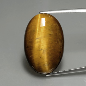20.21カラットの天然ゴールドブラウンTiger's Eye（24.7×16.7 mm・オーバルカット）