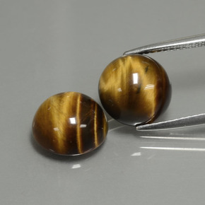 カラットの天然ゴールドブラウンTiger's Eye（10.14 mm・ラウンドカット）