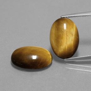 9.10カラットの天然ミディアム薄いブラウンTiger's Eye（14.1×10 mm・オーバルカット）