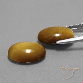 Shop natural 9.06ct ゴールドブラウン タイガーズアイ gems, 楕円形, from タイ at GemSelect. In stock, global shipping!