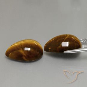 Shop natural 22.82ct ウォームブラウン タイガーズアイ gems, 洋梨の形, from タイ at GemSelect. In stock, global shipping!