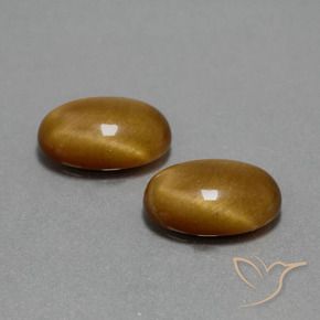 Shop natural 9.05ct ゴールドブラウン タイガーズアイ gems, 楕円形, from タイ at GemSelect. In stock, global shipping!