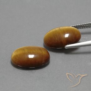 Shop natural 9.08ct ミディアム薄いブラウン タイガーズアイ gems, 楕円形, from タイ at GemSelect. In stock, global shipping!
