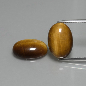 9.08カラットの天然ウォームブラウンTiger's Eye（14×10 mm・オーバルカット）