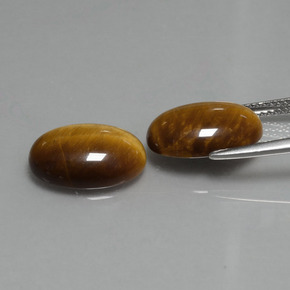 9.08カラットの天然ウォームブラウンTiger's Eye（14×10 mm・オーバルカット）