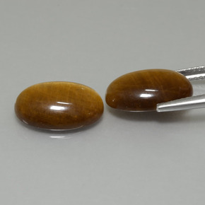 9.19カラットの天然ミディアム薄いブラウンTiger's Eye（14×10 mm・オーバルカット）