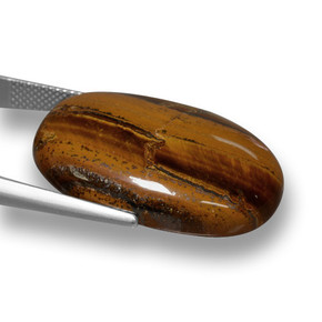 33.59カラットの天然赤みがかった茶Tiger's Eye（28.1×19.6 mm・オーバルカット）