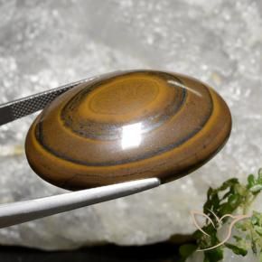 89.36カラットの天然シーダーブラウンTiger's Eye（34.7×27.1 mm・オーバルカット）