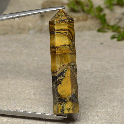 23.84カラットの天然ミディアムダークブラウンTiger's Eye（36.1×8.7 mm・ファンシーシェイプ）