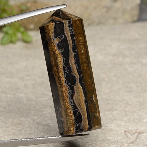 32.91カラットの天然ウォームブラウンタイガーズアイ、ファンシーシェイプ、オペーク