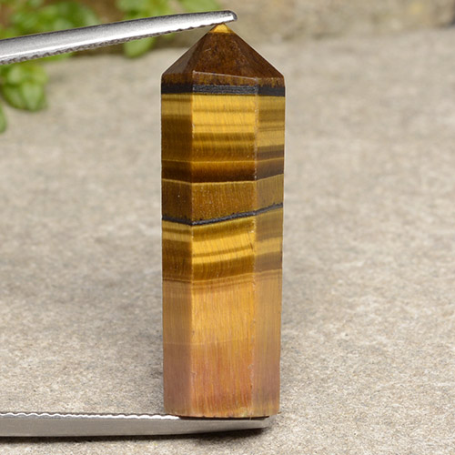 18.73カラットの天然ゴールデンブラウンTiger's Eye（28.8×9.2 mm・ファンシーシェイプ）
