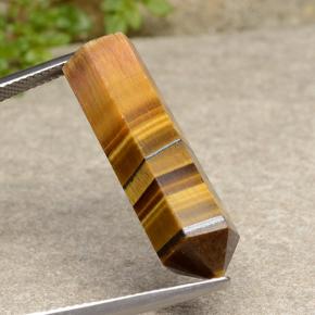 18.73カラットの天然ゴールデンブラウンTiger's Eye（28.8×9.2 mm・ファンシーシェイプ）