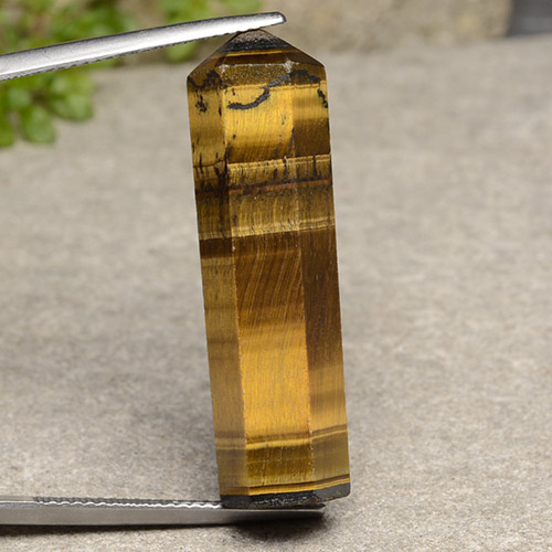 24.72カラットの天然ライトブラウンTiger's Eye（33.1×9.5 mm・ファンシーシェイプ）