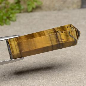 24.72カラットの天然ライトブラウンTiger's Eye（33.1×9.5 mm・ファンシーシェイプ）