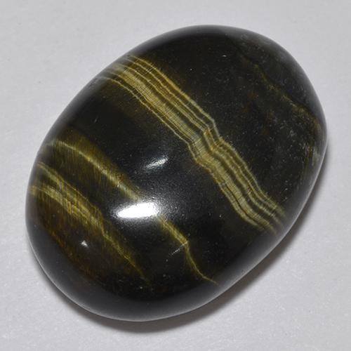 19.06カラットの天然マルチカラーTiger's Eye（19.4×14.6 mm・オーバルカット）