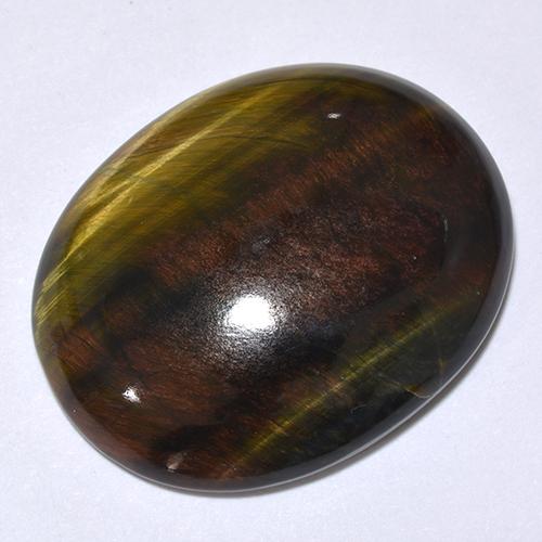 24.66カラットの天然マルチカラーTiger's Eye（25.3×20.2 mm・オーバルカット）