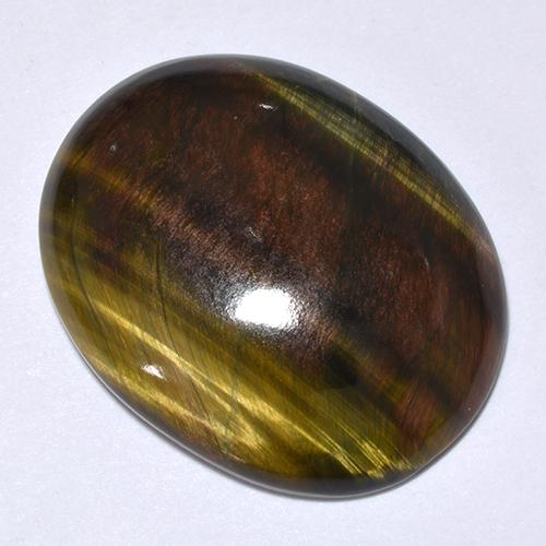 24.66カラットの天然マルチカラーTiger's Eye（25.3×20.2 mm・オーバルカット）