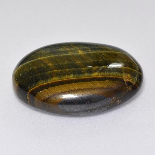 12.92カラットの天然マルチカラーTiger's Eye（19.8×15.7 mm・オーバルカット）