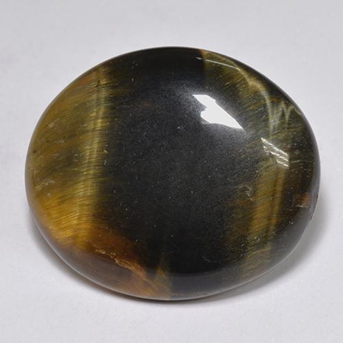 14.43カラットの天然マルチカラーTiger's Eye（20.6×17.6 mm・オーバルカット）