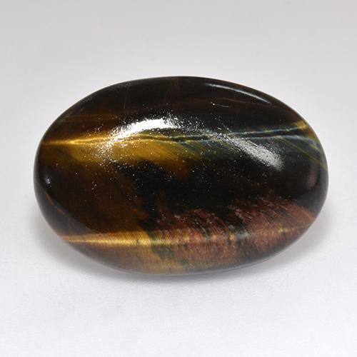 18.46カラットの天然マルチカラーTiger's Eye（23.4×15.8 mm・オーバルカット）