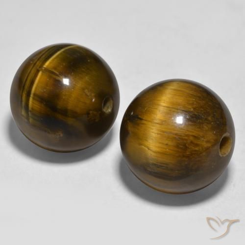 Shop natural 23.50ct ウォームブラウン タイガーズアイ gems, スフェア / ボール, from インド at GemSelect. In stock, global shipping!