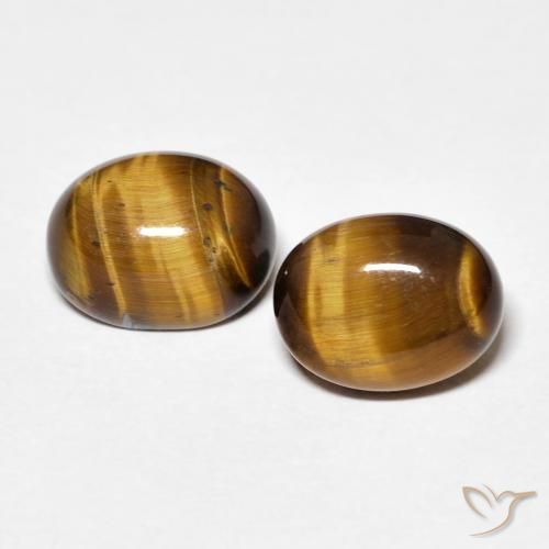 Shop natural 4.12ct 黄色がかったブラウン タイガーズアイ gems, 楕円形, from タイ at GemSelect. In stock, global shipping!