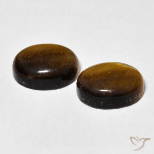 Shop natural 5.80ct ゴールドブラウン タイガーズアイ gems, 楕円形, from タイ at GemSelect. In stock, global shipping!