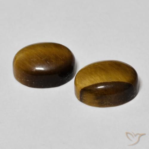 Shop natural 6.17ct 黄色がかったブラウン タイガーズアイ gems, 楕円形, from タイ at GemSelect. In stock, global shipping!