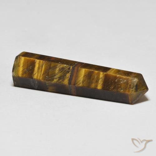26.11カラットの天然シーダーブラウンTiger's Eye（37×10 mm・ファンシーシェイプ）