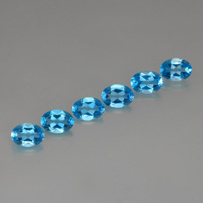 カラットの天然スイスブルートパーズ（7.1×5.1 mm・オーバルカット）