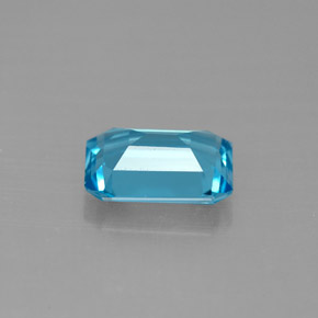 1.55カラットの天然スイスブルートパーズ（8.1×6.1 mm・エメラルドカット）