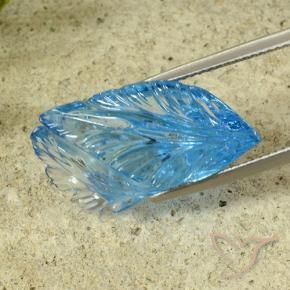 23.87カラットの天然スイスブルートパーズ、フラワーカット、透明