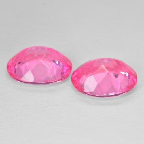 Shop natural 10.97ct 濃いマゼンタ トパーズ gems, 楕円形, from ブラジル at GemSelect. In stock, global shipping!