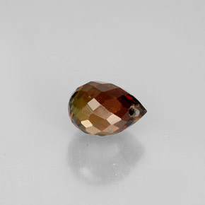 0.62カラットの天然緑がかったオレンジトルマリン（5.6×4 mm・ブリオレット）