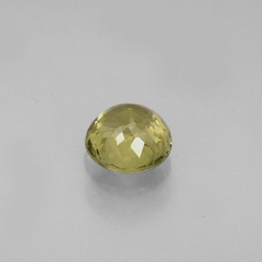 0.77カラットの天然緑がかったゴールドトルマリン（5.61 mm・ラウンドカット）