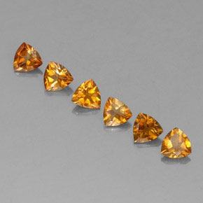 1.24カラットの天然イエローオレンジトルマリン（4.1×4 mm・トリリアント）