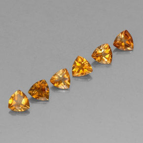 1.24カラットの天然イエローオレンジトルマリン（4.1×4 mm・トリリアント）