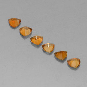 1.24カラットの天然イエローオレンジトルマリン（4.1×4 mm・トリリアント）